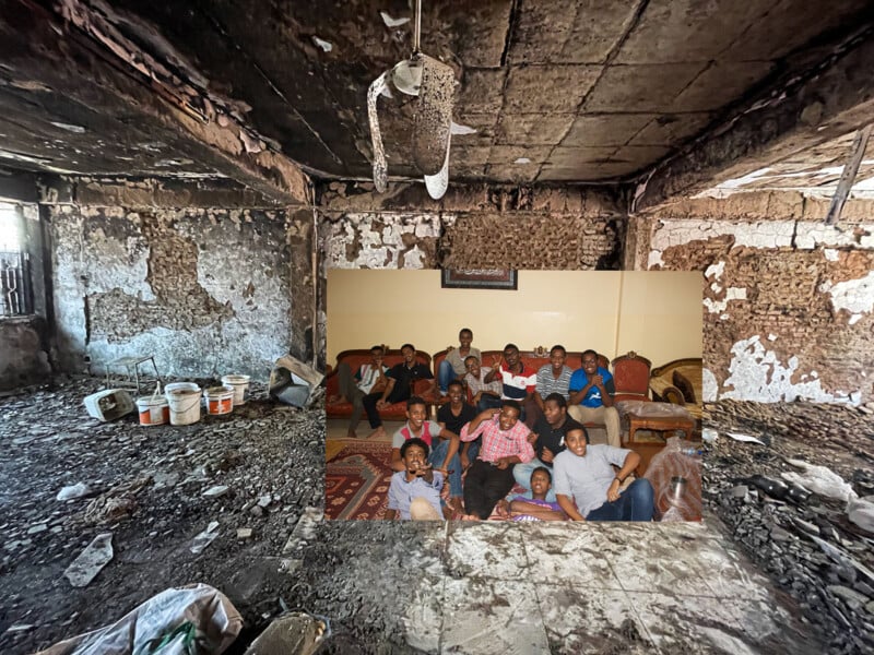 A group of people pose and smile together in a bright living room; their photo is superimposed over the background of a room damaged by fire, with charred walls and debris on the floor.