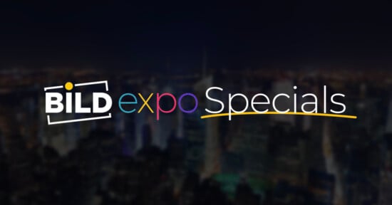 Text logo reading "BILD expo Specials" over a blurred cityscape at night; "BILD" is in bold white font, "expo" in colorful letters, and "Specials" in white with a yellow underline.