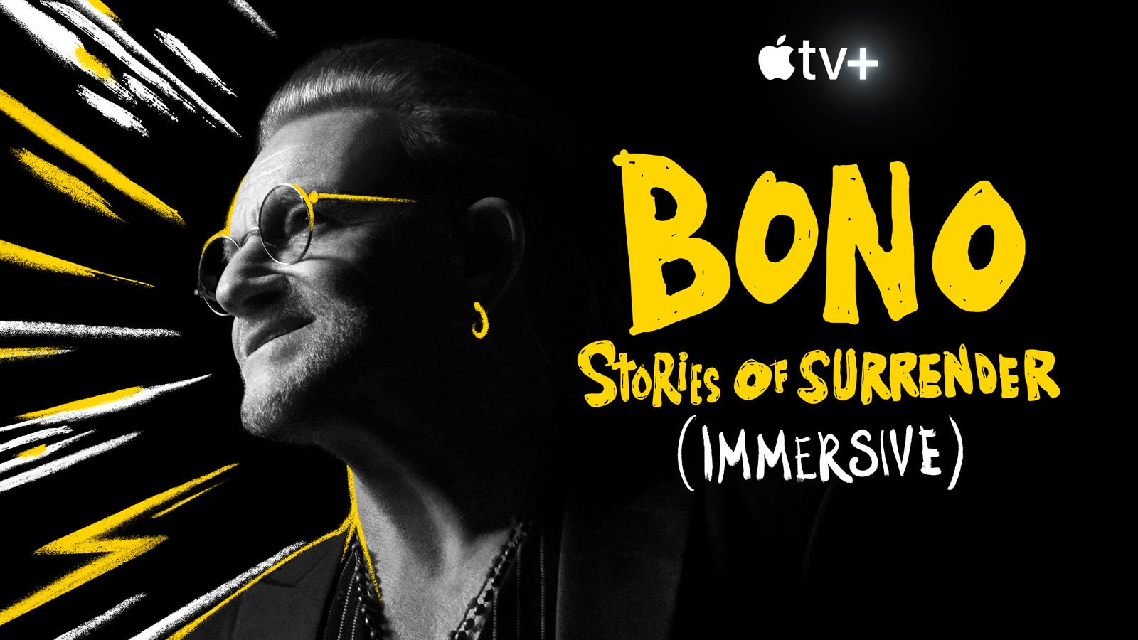 Black and white image of Bono wearing sunglasses and looking sideways, with yellow artistic accents; text reads: "Apple TV+. BONO Stories of Surrender (Immersive).