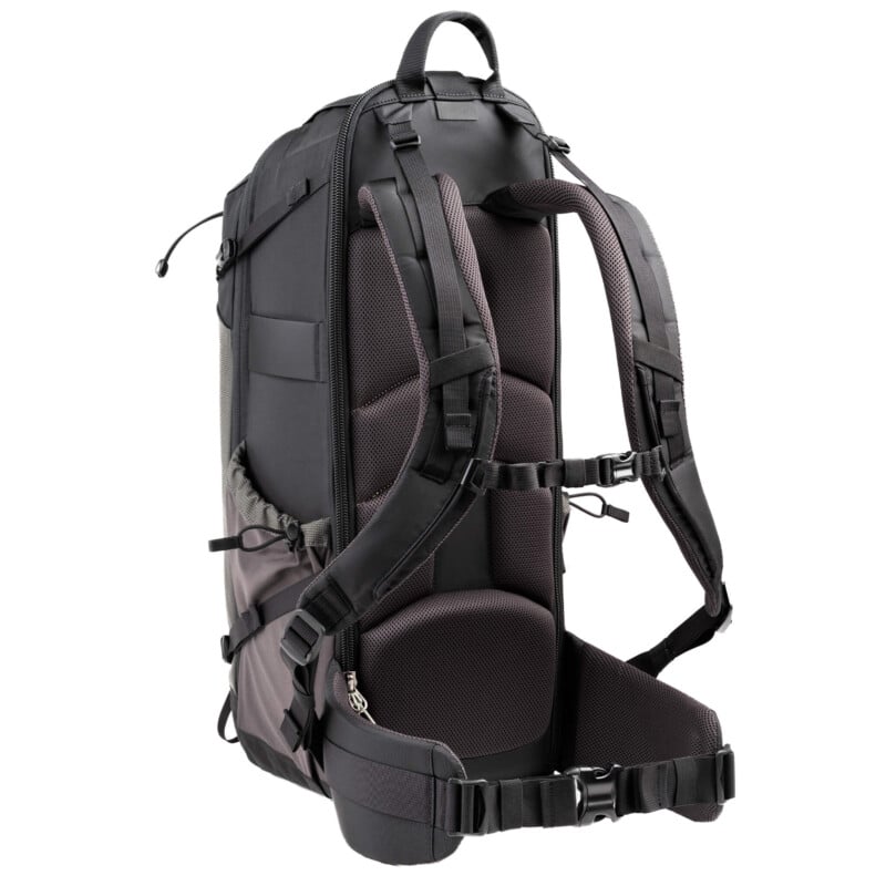 A black and dark gray hiking backpack shown from the back, featuring padded shoulder straps, a padded back panel, an adjustable sternum strap, and a padded hip belt for support and comfort.