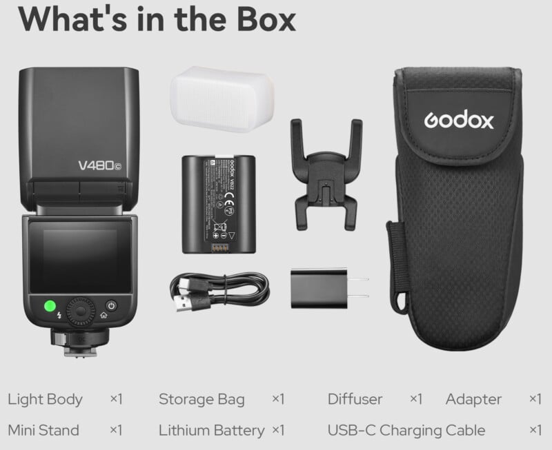 Contents of a Godox V480 flash box laid out, including the flash unit, storage bag, mini stand, lithium battery, USB-C cable, diffuser, and adapter, all labeled and shown from above.