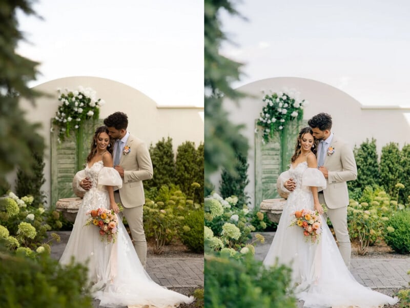 A bride in a white gown holds a bouquet of flowers while standing with a groom in a beige suit in a garden, surrounded by greenery and white floral arrangements. The couple poses affectionately for their wedding photo.
