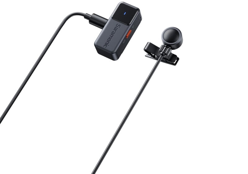 A black Saramonic wireless lavalier microphone system with a small clip-on mic and a rectangular transmitter connected by a cable, displayed on a white background.