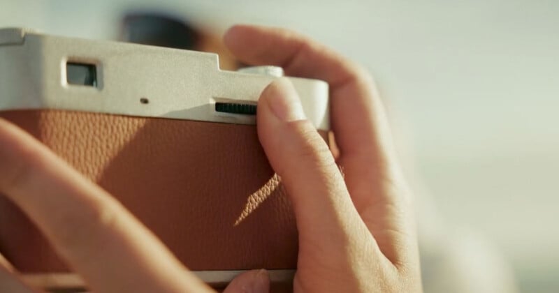 A person holding a camera.