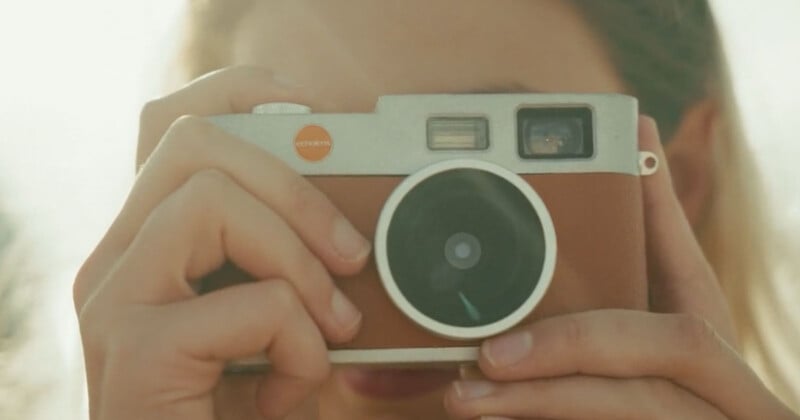A person holding a camera.