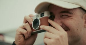 A man holding a camera.