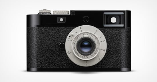 A black and silver vintage-style camera with a textured grip, a round lens in the center, and a viewfinder on the top right side against a plain white background.