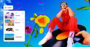 A person in a red outfit and white sneakers sits on a large vinyl record against a bright blue sky, surrounded by colorful flowers. A “Layers” menu appears on the left with options: Flowers, Portrait, Vinyl, and Landscape.