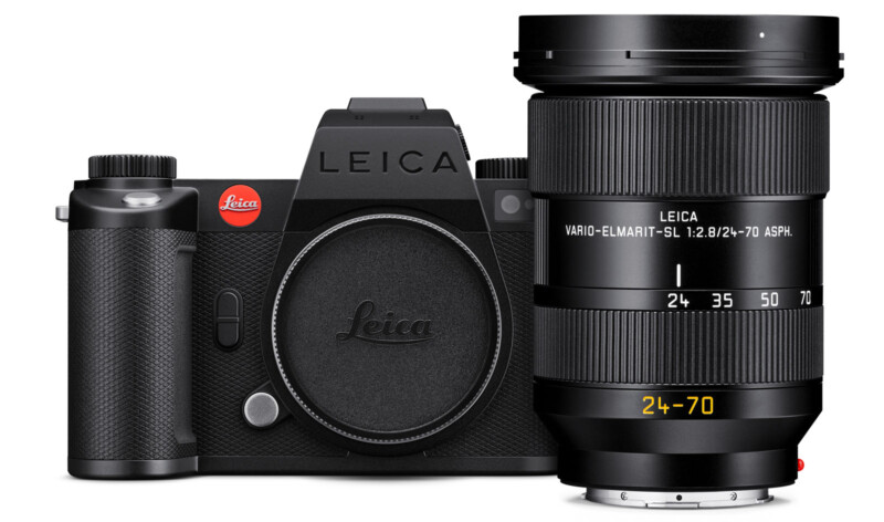 A black Leica camera body with a textured grip is shown next to a detachable Leica Vario-Elmarit-SL 24-70mm f/2.8 lens, both displayed against a white background.