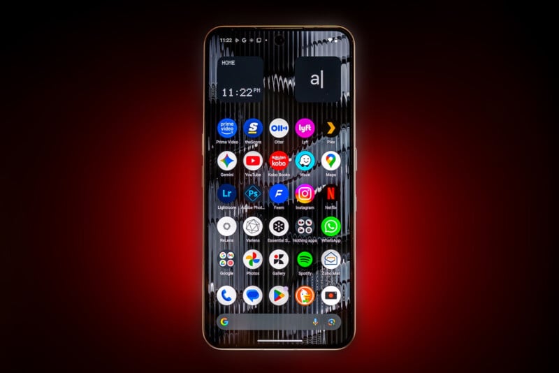 A smartphone with a dark, striped background displays various app icons on its home screen, including social media, messaging, streaming, and utility apps, against a red glowing backdrop.