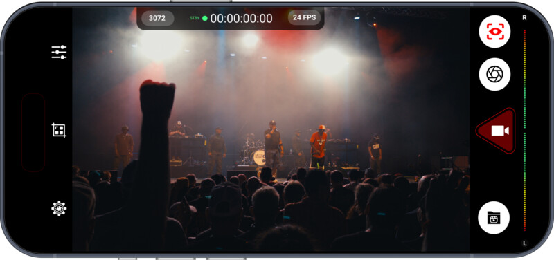 A smartphone screen displays a live video recording of a concert with a crowd in the foreground, a raised fist, and performers on a smoky stage under colorful lights. Recording controls and icons are visible on the device interface.