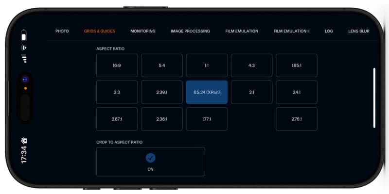 A smartphone screen displays a camera app's aspect ratio selection menu, with various aspect ratio options shown in buttons. The "65:24 (XPanal)" option is selected. Crop to aspect ratio toggle is set to "On".