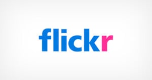 The image shows the Flickr logo with the word "flickr" in lowercase letters; "flick" is in blue and the "r" is in pink on a white background.
