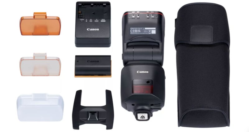 Canon camera flash kit including a flash unit, battery charger, battery, orange and white diffuser covers, flash stand, and a black carrying case, all arranged on a white background.
