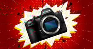 A Nikon mirrorless camera is displayed against a bold, comic-style red, yellow, and white burst background.