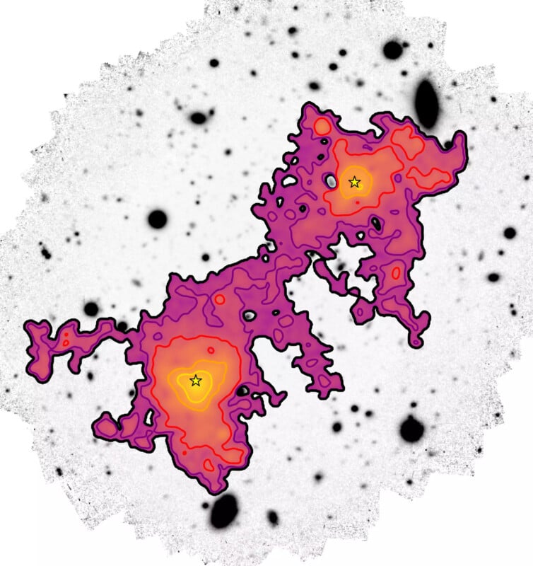 A black-and-white image of space shows two bright galaxy clusters, colored with red, orange, and purple contours, surrounded by scattered black dots representing distant stars and galaxies.