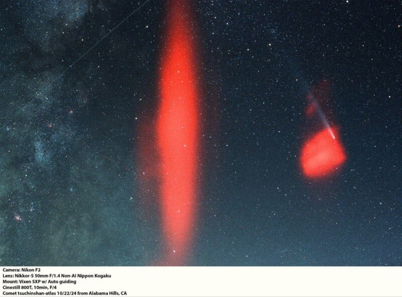 A night sky filled with stars features two large, red, glowing streaks—one vertical and one oval-shaped—possibly caused by atmospheric or astronomical phenomena. A camera settings label appears at the bottom.