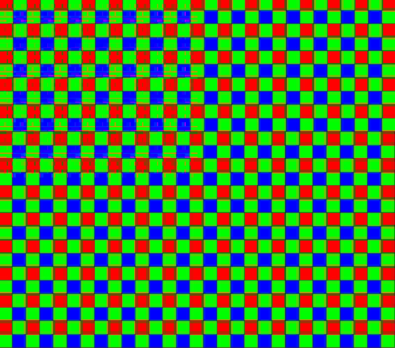 A seamless checkerboard pattern with alternating small squares in red, green, and blue, creating a colorful, repetitive grid across the entire image.