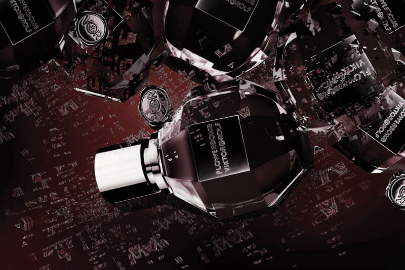 A close-up of multiple faceted perfume bottles with metallic caps, floating against a dark red, reflective background. The bottles are labeled "Flowerbomb Viktor&Rolf.