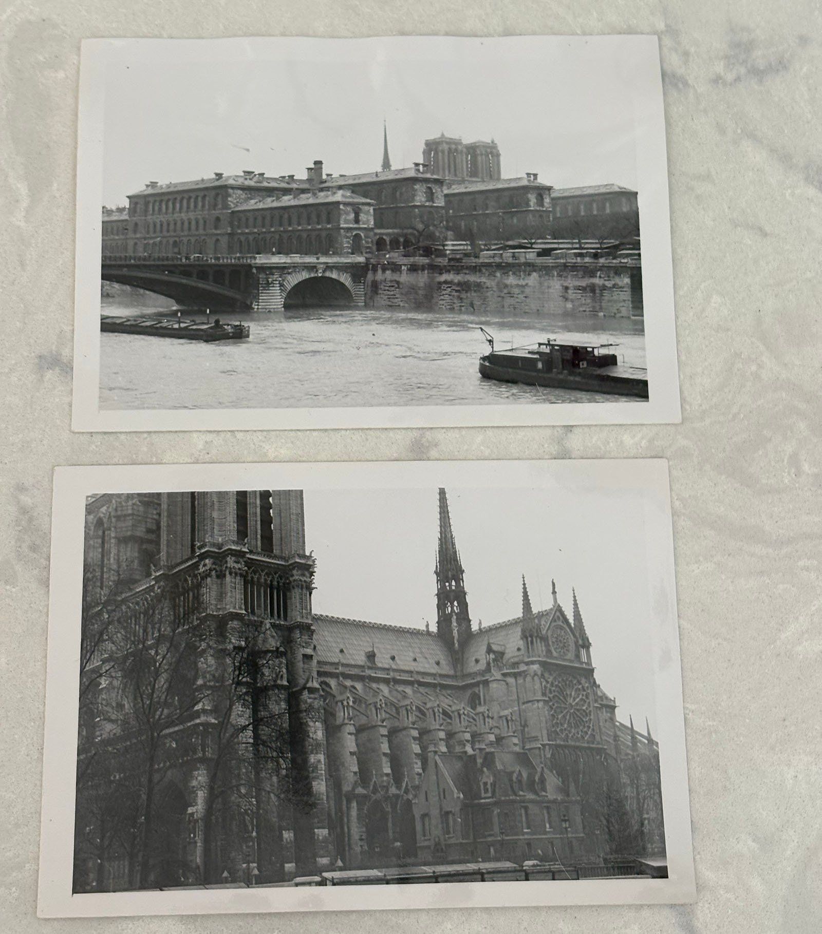 Two black-and-white photos: the top shows a riverside cityscape with a bridge and a large historic building; the bottom shows the side view of a Gothic cathedral with intricate architecture and spires.