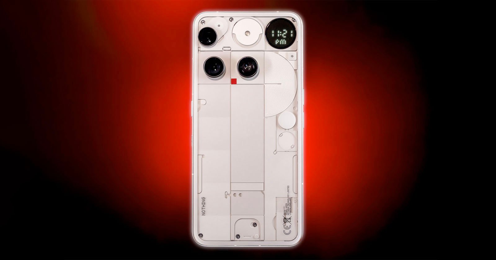 A transparent smartphone with visible internal components is centered on a red and black gradient background, featuring three rear camera lenses and a minimalist design.