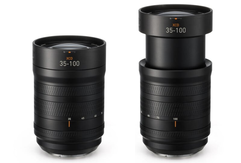 Two black camera zoom lenses labeled “XCD 35-100” are shown side by side; one lens is retracted, and the other is extended, displaying the difference in length when zoomed.