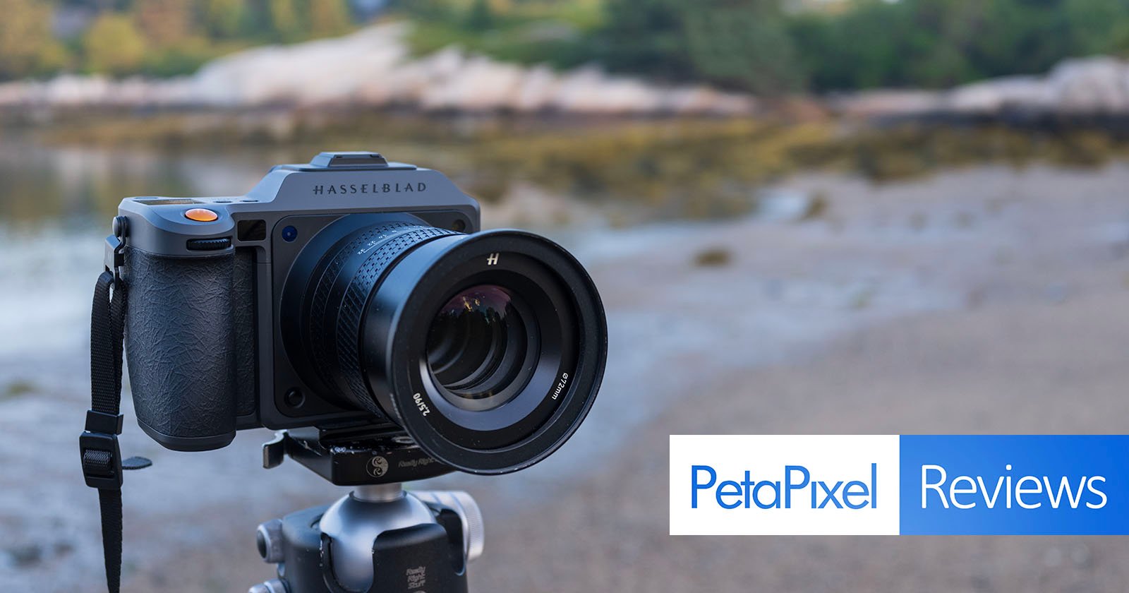 A Hasselblad camera mounted on a tripod outdoors, with a blurred natural background. The image features the Petapixel Reviews logo in the bottom right corner.
