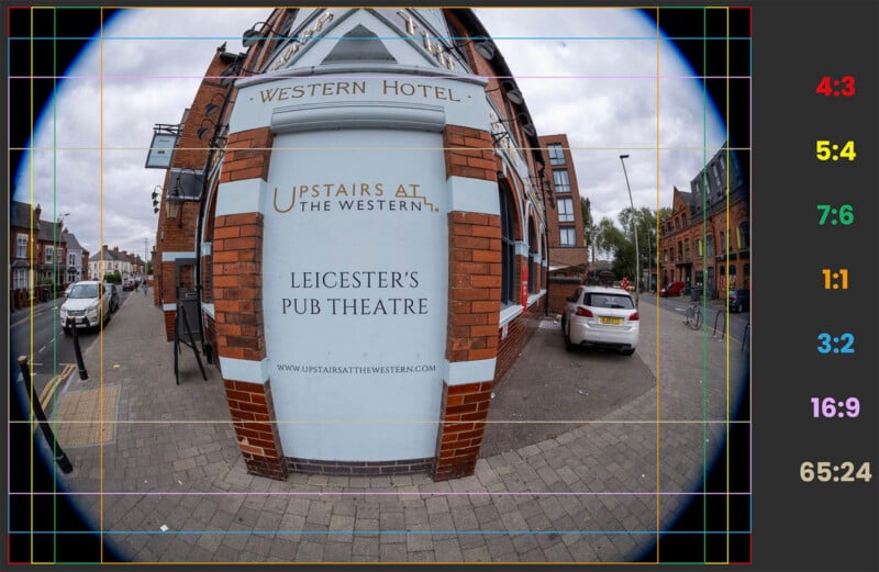 A fisheye lens photo of a red-brick building with a sign reading "Western Hotel. Upstairs at the Western. Leicester's Pub Theatre." Parked cars and a street with buildings are visible on both sides.