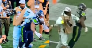 A football player in a blue uniform accidentally collides with a sideline photographer wearing a tan vest and white hat during a game. The moment is shown from two different angles side by side.