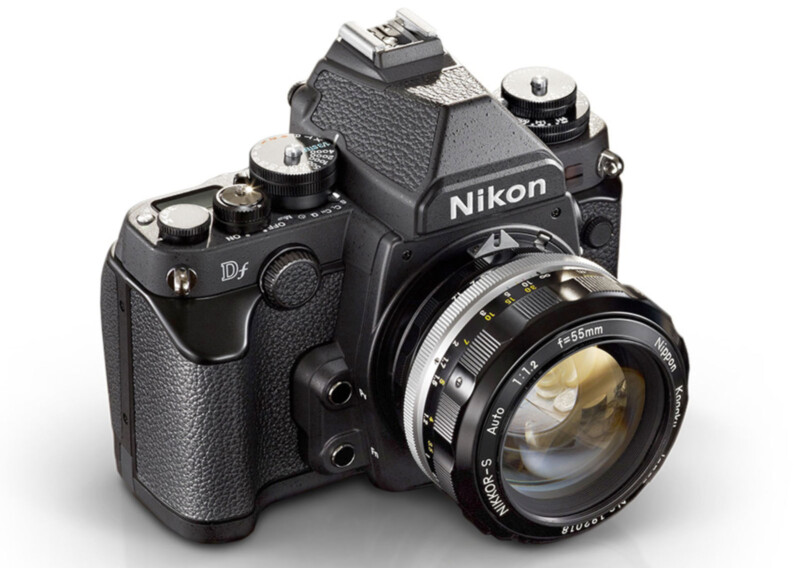 A black Nikon Df digital camera with a NIKKOR-S Auto 1:1.2 f=55mm lens is shown on a white background, displaying its classic design with various dials and textured grip.