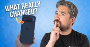 A man with a thoughtful expression holds his finger to his lips, looking at a black Google smartphone. Text reads "WHAT REALLY CHANGED?" with an arrow pointing to the phone. The background is blue with a pixel pattern.