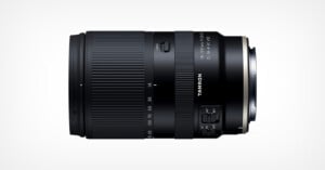 A black Tamron camera lens, model 18-300mm F/3.5-6.3 Di III-A VC VXD, shown in a side profile view on a plain white background.