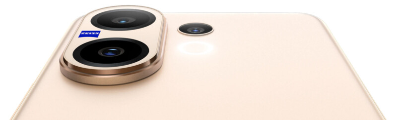 Close-up of the back of a beige smartphone featuring two large rear camera lenses in a raised module with a ZEISS logo, and a smaller camera lens beside it.