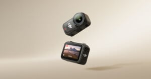 Two compact action cameras float against a beige background. One shows its lens and the other displays a mountain landscape on its screen. Both cameras have the DJI logo visible.