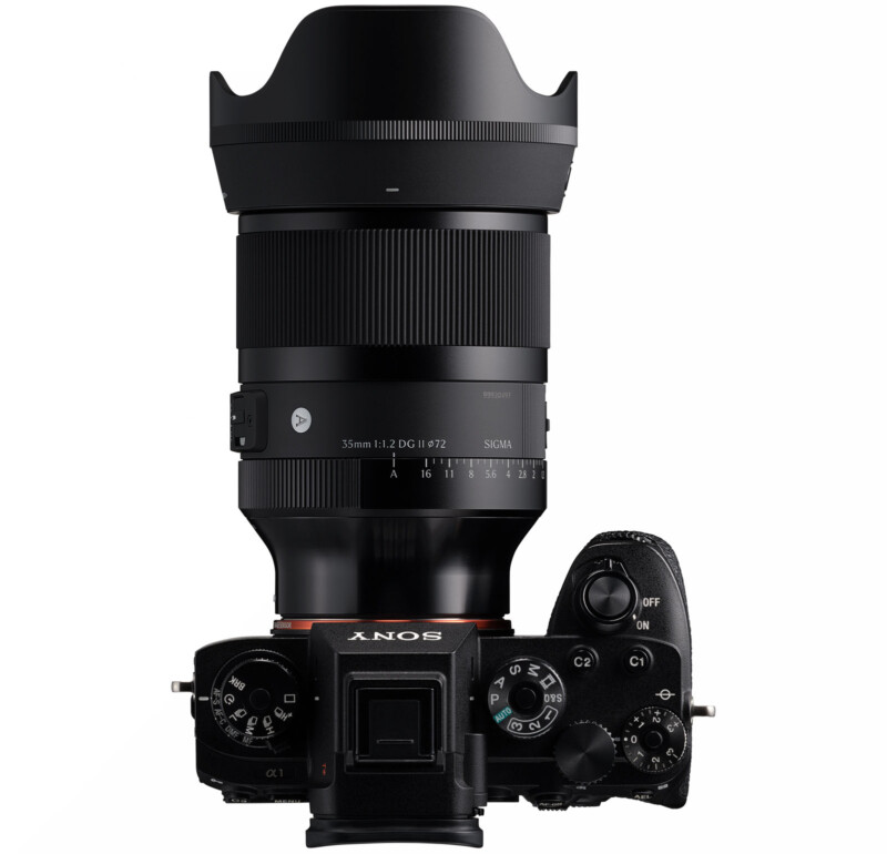 A top view of a Sony camera with a mounted Sigma 15mm f/1.2 DG DN Art lens, showing the camera's controls and dials and the lens’s focus and aperture rings.