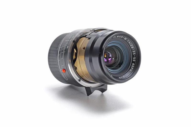 A camera lens with a white background.