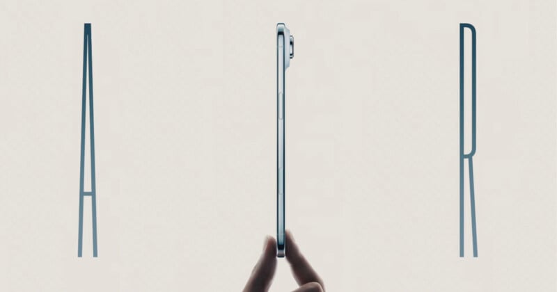 A hand holds a thin tablet upright between two large, stylized letters "A" and "R," emphasizing the slim design with the word "AIR" suggested in the background.