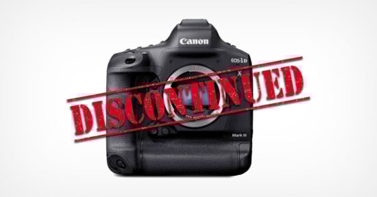 A Canon EOS-1D camera body is shown with a large red "DISCONTINUED" stamp across it on a white background.