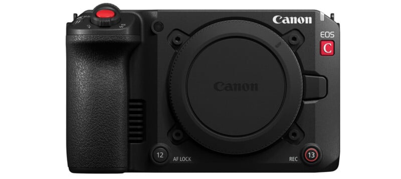 Front view of a black Canon EOS camera body, showing a textured grip, various buttons, and the Canon logo; there is no lens attached, and the body cap is in place.