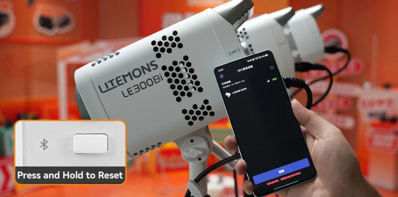 A hand holds a smartphone connected via Bluetooth to a white Litemons LE300Bi light. Inset shows a close-up of a Bluetooth reset button labeled "Press and Hold to Reset.