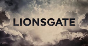 The word "LIONSGATE" in bold, dark letters is centered against a dramatic sky background with clouds and rays of light shining through.