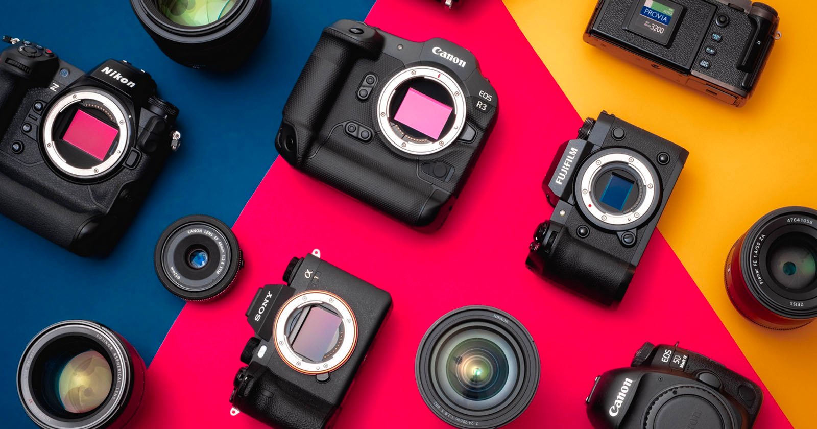 Various digital cameras and camera lenses from brands like Canon, Nikon, Sony, and Fujifilm are arranged on a colorful background with blue, red, and yellow sections.