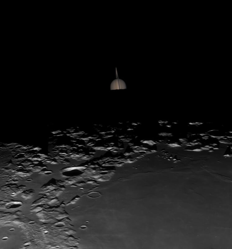 A view from the Moon’s surface shows a rugged, cratered landscape under dim light, with a partially illuminated planet—Earth—rising above the horizon against the blackness of space.