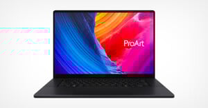 A sleek black laptop with a colorful abstract swirl on the screen and the word "ProArt" displayed on the right side. The device is open and viewed from the front against a plain white background.