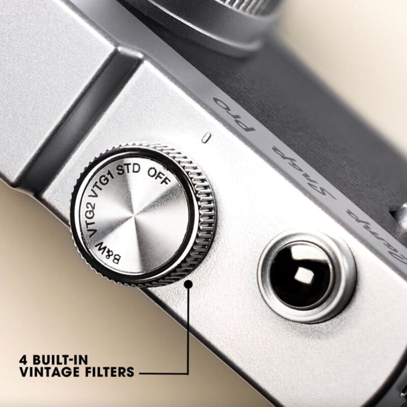 Close-up of a camera dial showing options for B&W, VTG2, VTG1, and STD, with a label pointing to the dial that reads "4 Built-in Vintage Filters." Part of the camera body and a port are also visible.