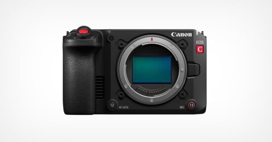 Front view of a Canon EOS C mirrorless digital camera body without a lens, showing the sensor, grip, and various control buttons against a plain white background.