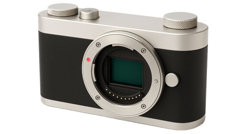 A modern digital camera body with a silver and black design, featuring a prominent lens mount and sensor visible at the front, without a lens attached.