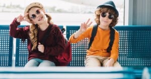 kids pose peace sign