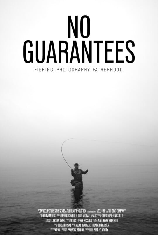 A black and white poster shows a person fly fishing in calm water, holding a fishing rod aloft. Large text reads "NO GUARANTEES" with smaller text below: "Fishing. Photography. Fatherhood." Credits are listed at the bottom.