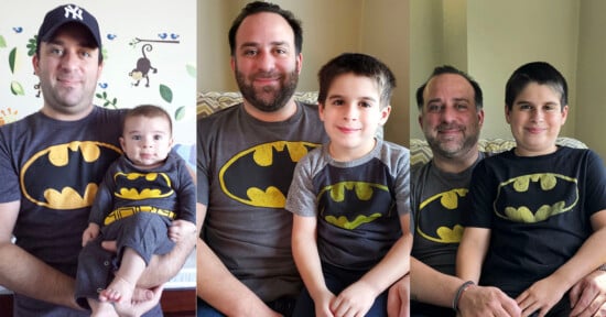 A man and a boy are seen in three side-by-side photos over time, both wearing Batman t-shirts. The boy grows older in each photo, and they smile together in a cozy home setting.